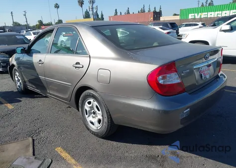 2004 Toyota Camry Le z USA, uszkodzony, nr VIN 4T1BE32K24U789868